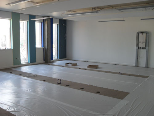 Carpet laid and walls painted in new building June 2010