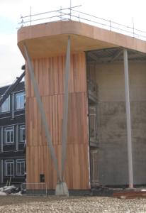 Shows the wooden gable end of the CS building under construction February 2010